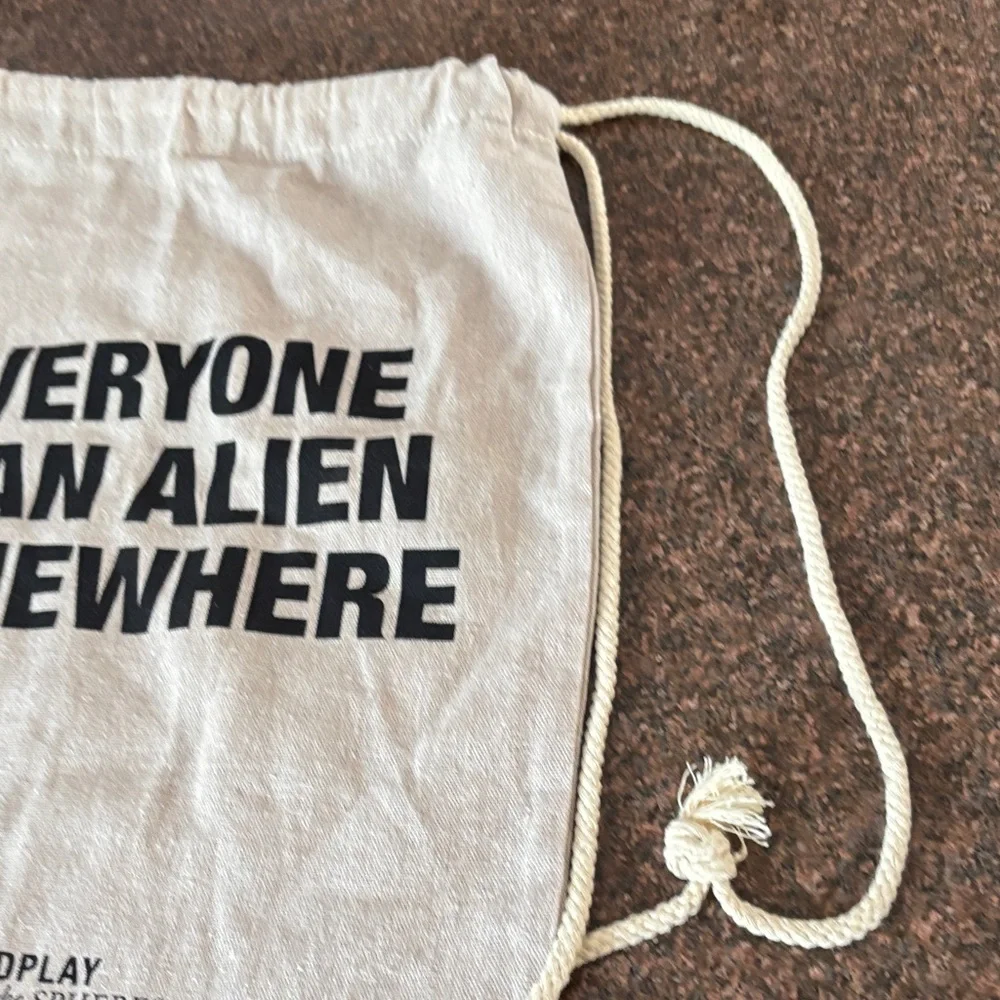 COLDPLAY EVERYONE IS AN ALIEN SOMEWHERE MUSIC OF THESPHERES DRAWSTRING BACKPACK